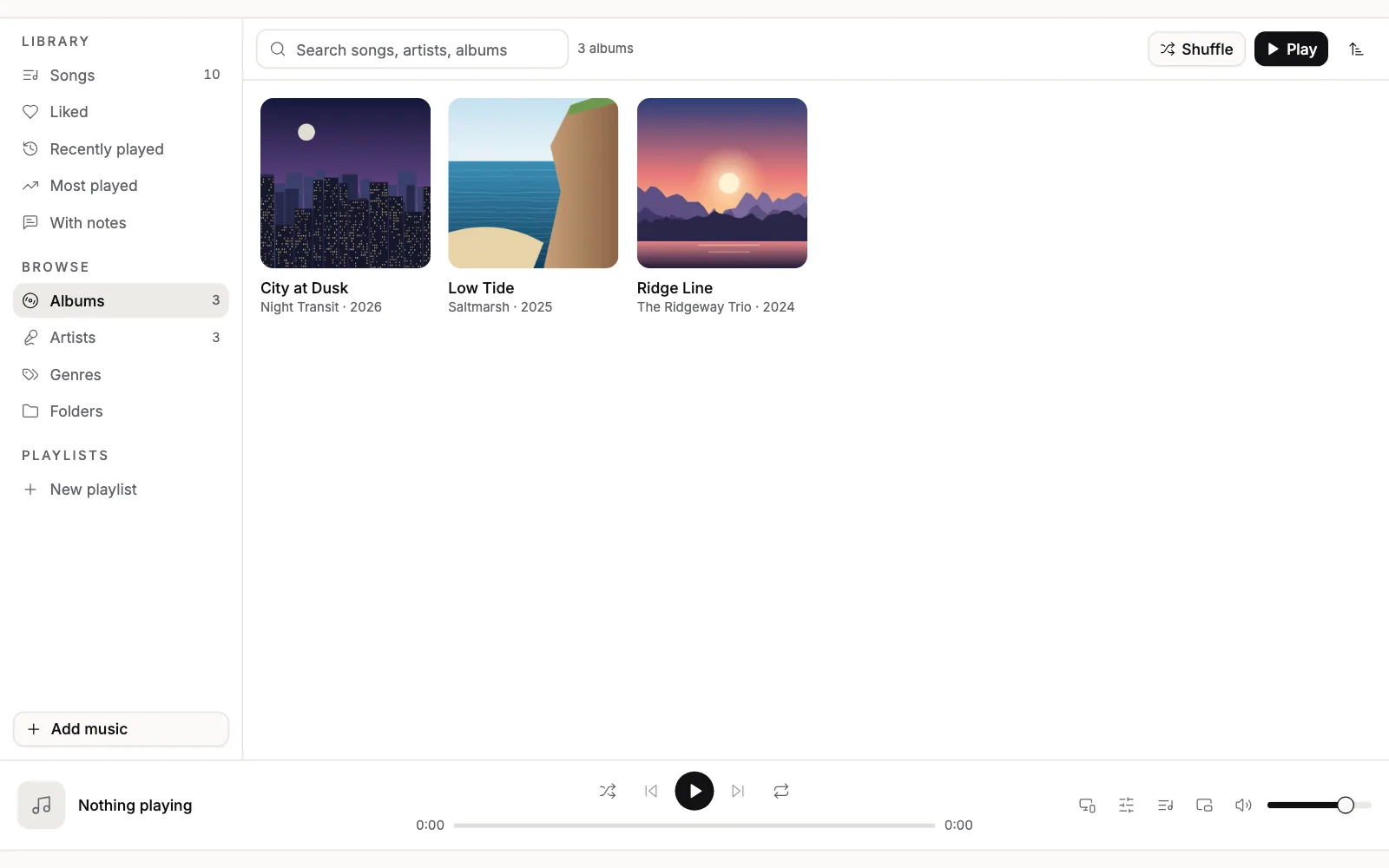 The Albums view: three album covers, Low Tide, City at Dusk and Ridge Line, with their artists